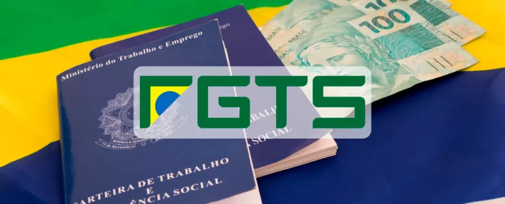 foto de carteira de trabalho com notas de cem e bandeira do brasil na frente logo do FGTS