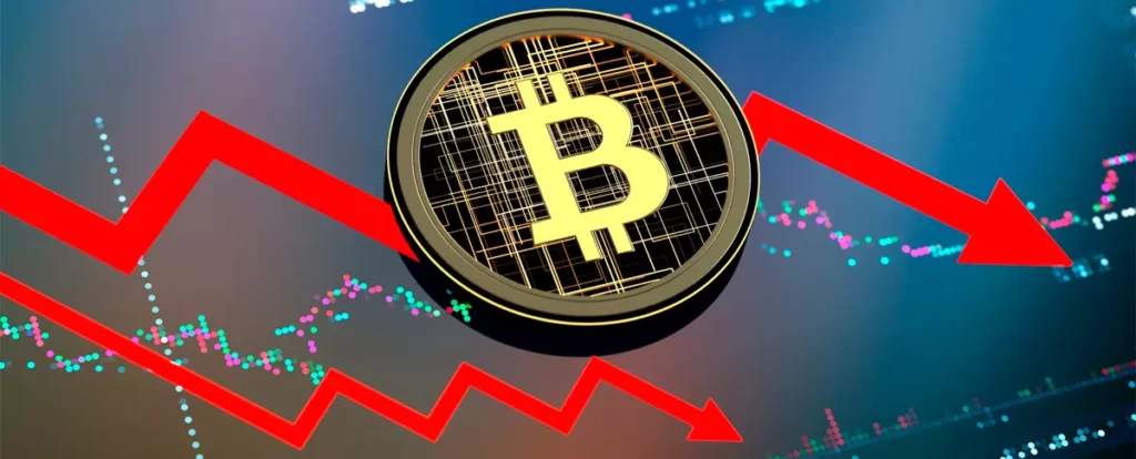 imagem de moeda de bitcoin na frente de um gráfico em queda