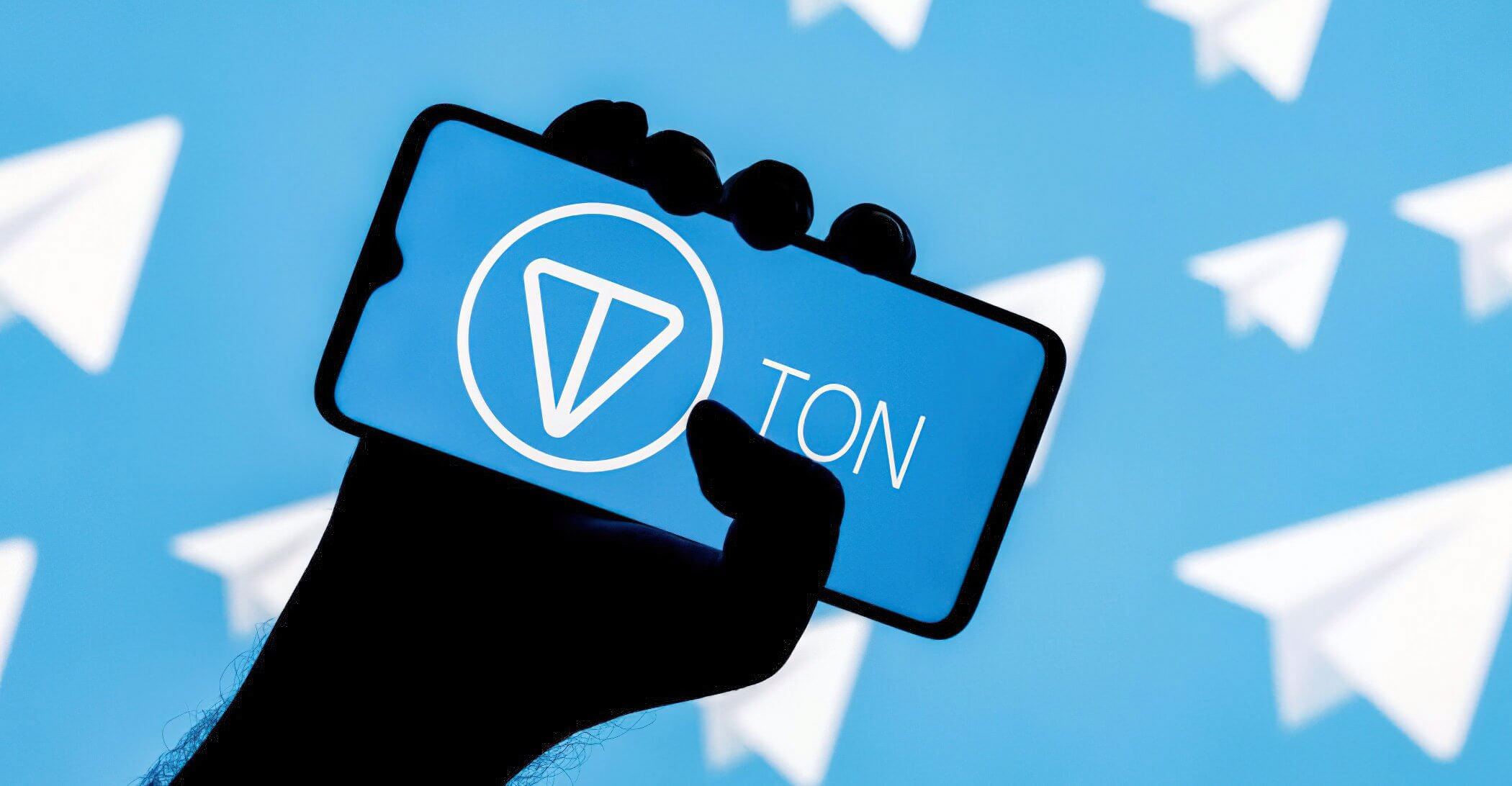 Imagem do logo da Ton Coin em um celular
